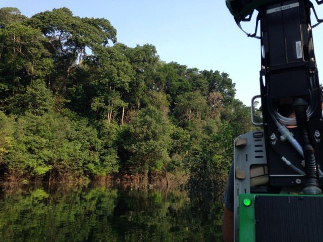Trekker-on-boat-in-Amazon1-640x480