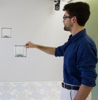 Researcher interacts with ShapeDrone